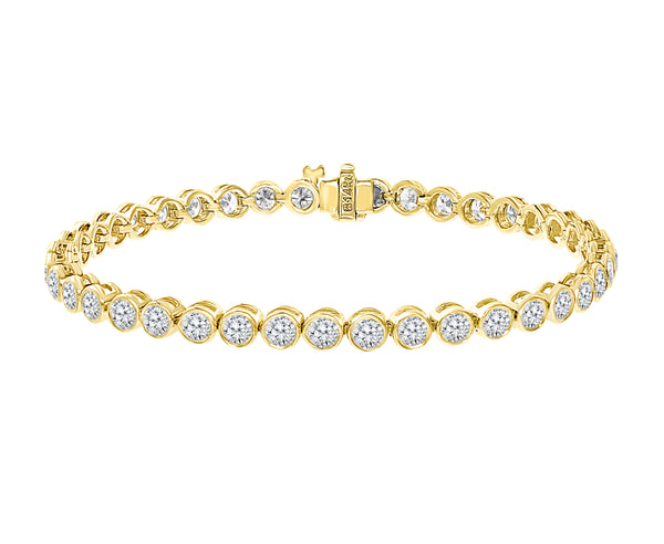 YELLOW GOLD BEZEL SET DIAMOND TENNIS BRACELET 6.28cttw.