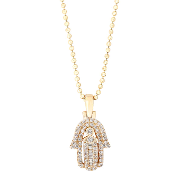 ICED OUT YELLOW GOLD DIAMOND HAMSA WITH ROUND CUT AND EMERALD CUT DIAMNDS.